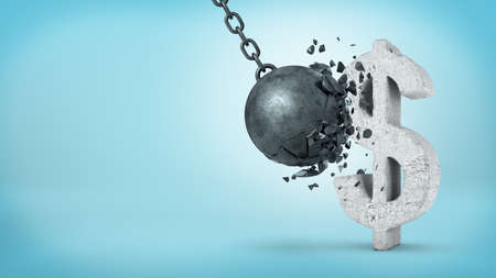 3d rendering of a large wrecking ball hitting a concrete USD sign and unable to break it on blue background.の写真素材