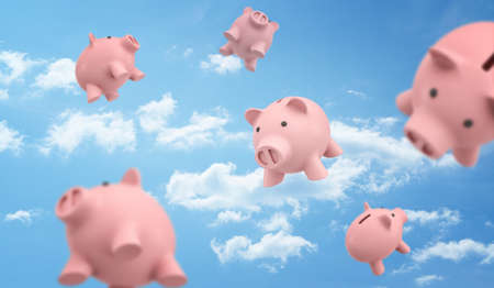 3d rendering of a many pink piggy banks flying freely on the blue cloudy sky background.の写真素材