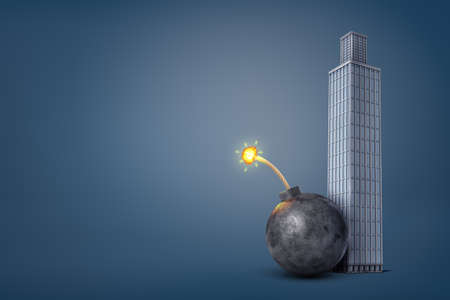3d rendering of a giant iron bomb with a lit fuse stands dangerously close to a tall office building.の写真素材