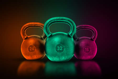 3d rendering of three similar metal kettle-balls in green, purple and orange metallic colors on a shady violet background.の写真素材