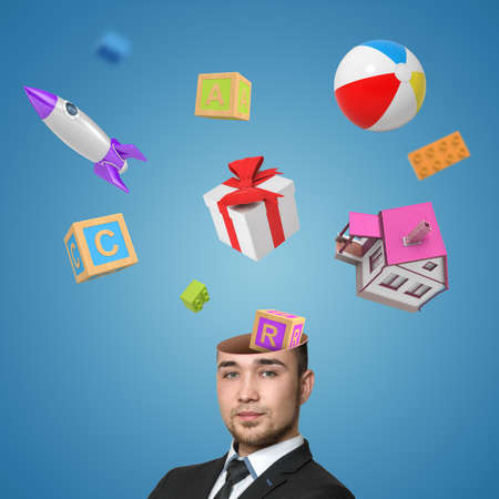 A view of a handsome young man with head cracked open and a bunch of toys popping out of it isolated on blue background.の写真素材