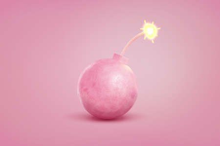 3d rendering of single large pink iron bomb with a lit fuse stands on a pastel pink background.の写真素材