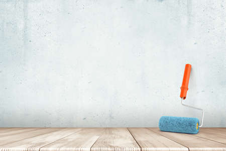 3d rendering of paint roller on white wooden floor and white wall backgroundの写真素材
