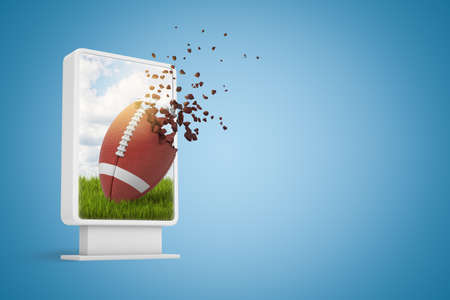3d rendering of digital display with oval ball for American football starting to dissolve in particles on screen on blue gradient background with copy space.の写真素材