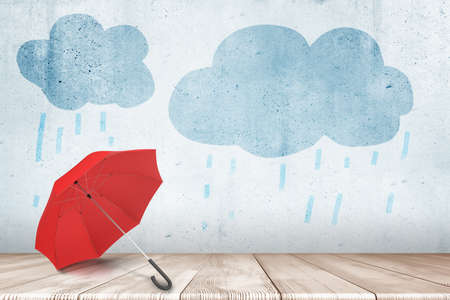 3d rendering of open red umbrella on wooden floor in room with light-blue painted clouds on wall.の写真素材