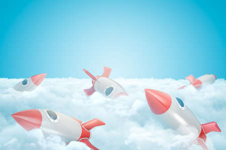 3d rendering of set of gray and red toy space rockets on layer of thick white fluffy clouds under...