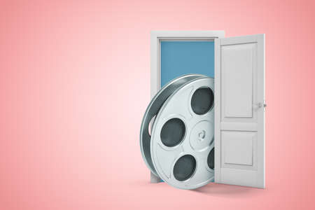 3d rendering of big film reel emerging from open door on pink copyspace background.の写真素材