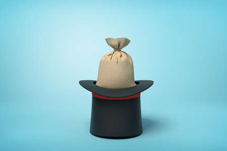 3d rendering of canvas money bag in black top hat which is standing upside down on light-blue background.の写真素材