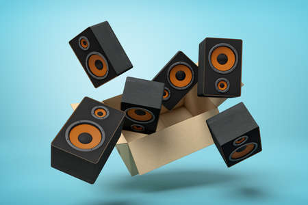 3d rendering of cardboard box in air full of black audio speakers which are flying out and floating...