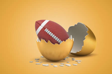 3d rendering of american football ball hatching out of golden egg on yellow backgroundの写真素材