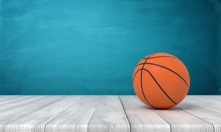 3d rendering of a basketball on wooden surface near blue wall.の写真素材