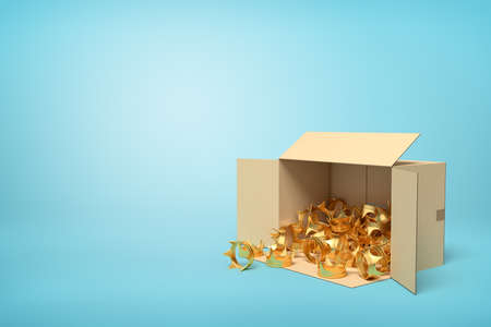 3d rendering of open cardboard box lying sidelong full of golden crowns on light-blue background with much copy space.の写真素材