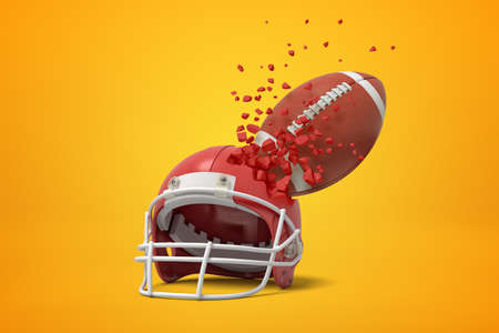 3d rendering of a red american football helmet and ball shattering into small pieces on yellow backgroundの写真素材