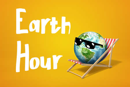3d rendering of earth globe model wearing sunglasses and having rest on beach chair with Earth Hour sign on yellow backgroundの写真素材
