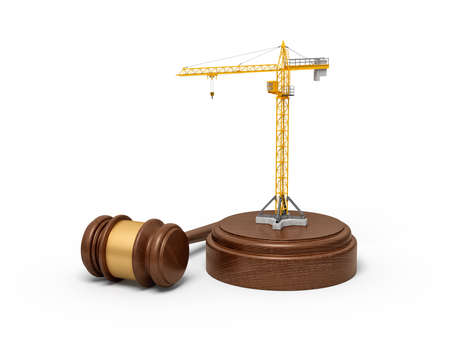 3d rendering of small construction crane standing on sounding block with judge gavel beside the block.の写真素材