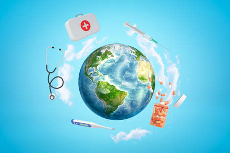 3d rendering of colored earth globe with first aid medical box, pills jar, syringe, stethoscope and digital thermometer on blue sky backgroundの写真素材