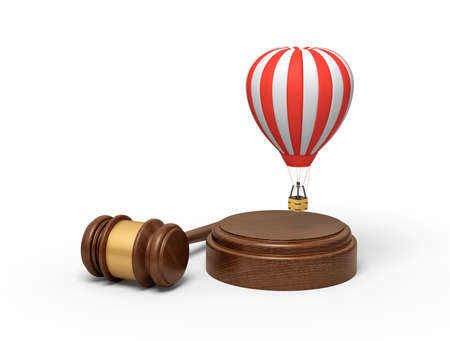 3d rendering of small striped hot-air balloon in air above brown sound block with gavel beside.の写真素材