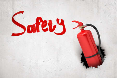 3d rendering of red fire extinguisher breaking white wall with red Safety sign on white backgroundの写真素材