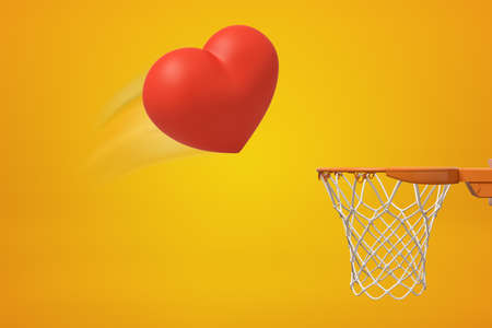 3d rendering of red heart flying into basketball hoop on yellow backgroundの写真素材