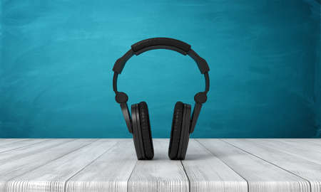 3d rendering of black headphones on white wooden floor and dark turquoise backgroundの写真素材