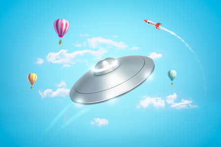 3d rendering of silver metal ufo with hot air balloons and silver red space rocket in the air on blue backgroundの写真素材
