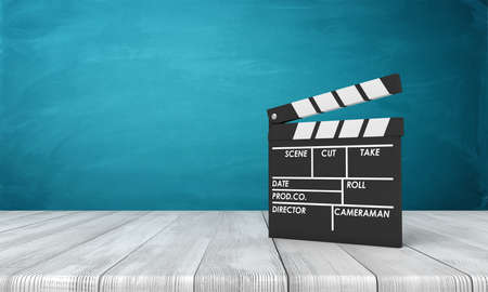 3d rendering of clapperboard standing on wooden surface near blue wall with some copy space.の写真素材