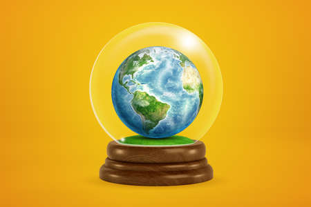 3d rendering of miniature planet Earth inside glass ball globe on amber background.の写真素材