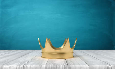 3d rendering of golden crown on white wooden floor and dark turquoise backgroundの写真素材