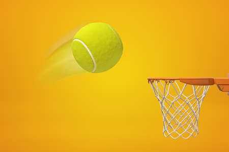 3d rendering of yellow tennis ball flying into basketball hoop on yellow backgroundの写真素材