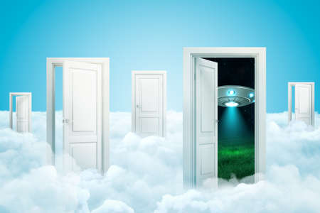 3d rendering of white clouds with open doorways and silver metal UFO behind a doorway on blue backgroundの写真素材