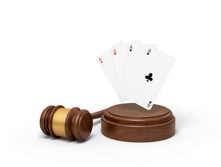 3d rendering of playing cards on round wooden block and brown wooden gavelの写真素材