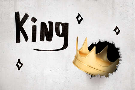 3d rendering of golden crown breaking white wall with King sign on white backgroundの写真素材