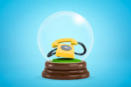 3d rendering of ringing yellow rotary phone inside glass ball globe on light blue gradient background.の写真素材