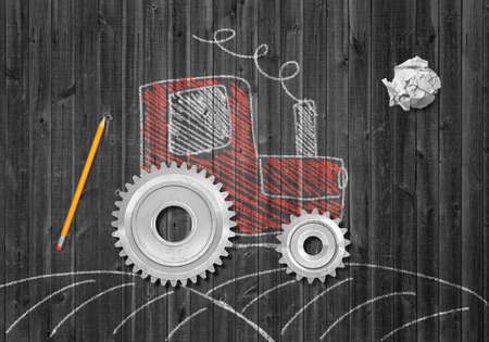 3d rendering of crumpled piece of paper, pencil, and chalk-drawn picture of tractor with real cogwheels instead of normal wheels on grey wooden background.の写真素材