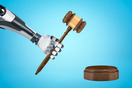3d rendering of robotic hand holding brown wooden gavel with round wooden block on blue background. Digital art. Objects and materials. Law and order.の写真素材