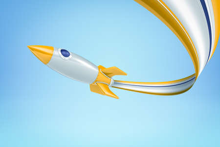 3d rendering of silver yellow space rocket with trail on blue backgroundの写真素材