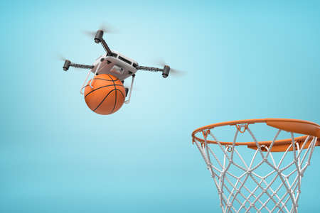 3d rendering of camera drone carrying basketball to basketball hoop on light blue background.の写真素材