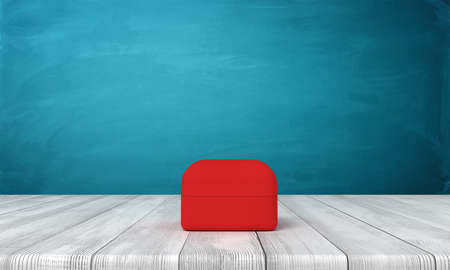 3d rendering of closed red ring box on wooden table near blue wall.の写真素材