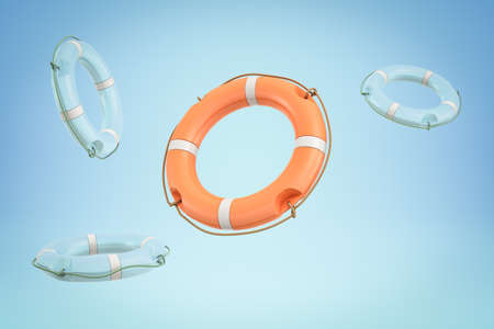3d rendering of one orange and three blue lifebuoy rings on blue backgroundの写真素材