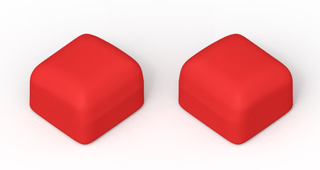 Closed red velvet ring boxes on a white backgroundの写真素材