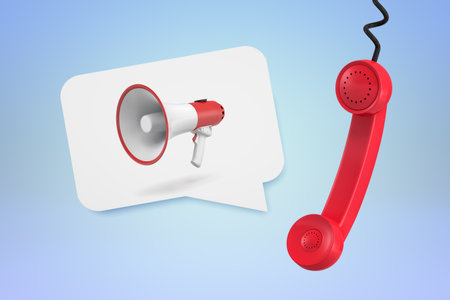 Megaphone and phone implying announcementの写真素材