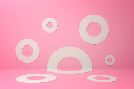 Circular arches and rings on pastel pink sceneの写真素材