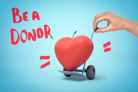 Anonymous mans hand pulling miniature hand truck with cute red heartの写真素材