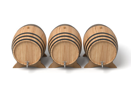 Aligned oak barrels with shadows and tapsの写真素材