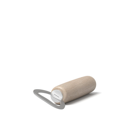 Tilted wooden handle bottle opener on whiteの写真素材