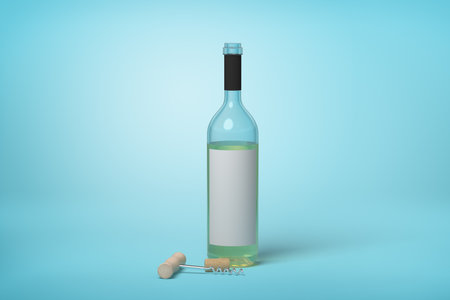 White wine bottle with corkscrew on blueの写真素材