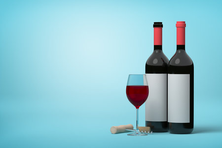 Red and white wine arrangement with blue backgroundの写真素材
