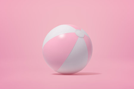3d rendering of rainbow beach ball on pink backgroundの写真素材