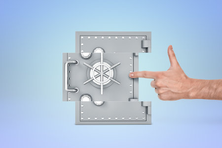 Finger pointing at a vault door conceptの写真素材