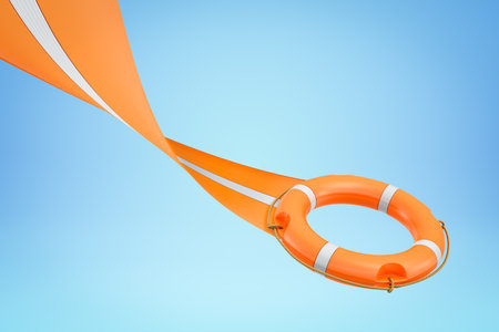 3d rendering of orange lifebuoy ring with trail on blue backgroundの写真素材